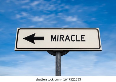 Miracle road sign, arrow on blue sky background. One way blank road sign with copy space. Arrow on a pole pointing in one direction.