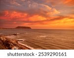 Miraflores, a district located in Lima, Peru, offers breathtaking sunset views along its coastline facing the Pacific Ocean