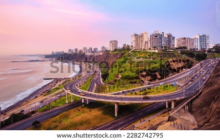 Miraflores Malecon on Pacific ocean coast in Lima city downtown, Peru, South America, in sunset light
