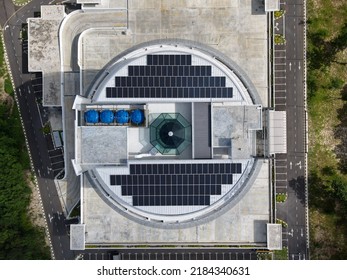 Miri, Sarawak – September 30, 2021: The Photo Showing An Aerial View Of A  Round Roof Top Of The Miri City Hall Building With Solar Pane On The Top Of The Structure.