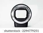 Mirroless camera lens adapter isolated in white with copy space. 
