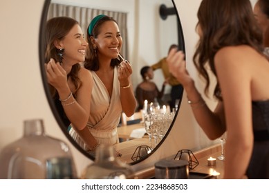 Mirror, beauty makeup and friends at party getting ready for new year celebration. Event, skincare cosmetics and happy women preparing for fun social gathering at night with lipstick at house party.