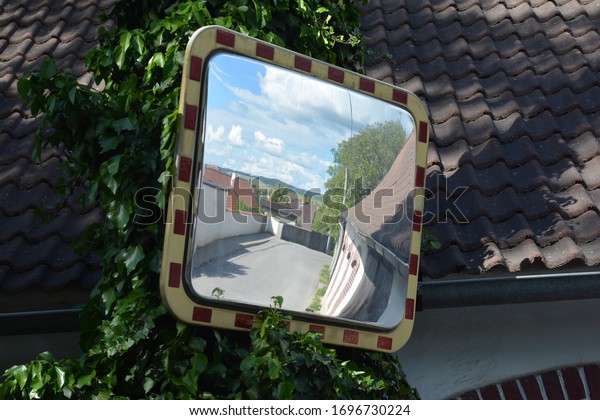 \
Mirror in the corner of the road for drivers to\
see better