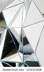 Mirror With Crystals In Wall, Decoration And Reflection. Abstract Glass Background. Polygonal Surface. Close-up. Texture.