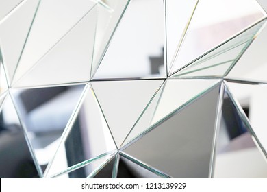 Mirror With Crystals In Wall, Decoration And Reflection. Abstract Glass Background. Polygonal Surface. Close-up. Texture.