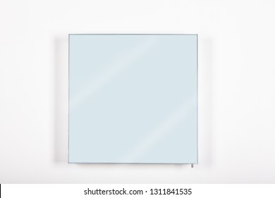 mirror framed on a minimal frame against a white background