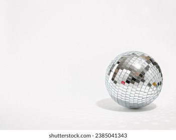 Mirror shining disco ball isolated. Copy space for text. Concept of party and celebration.