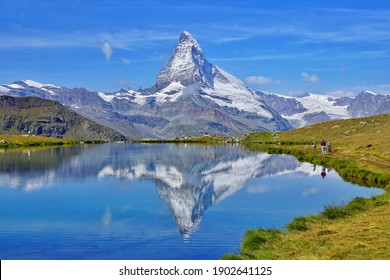 The Mirror View Of Matterhorn On Lake. Swiss