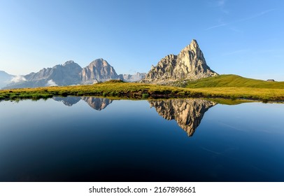 Mirror Water Of A Lake In A Mountain Valley. Mountain Lake Water. Calm Water Of Mountain Lake. Lake In Mountain Valley