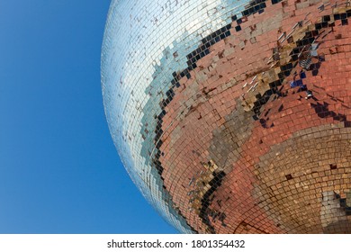 Mirrorball Reflections And Blue Sky