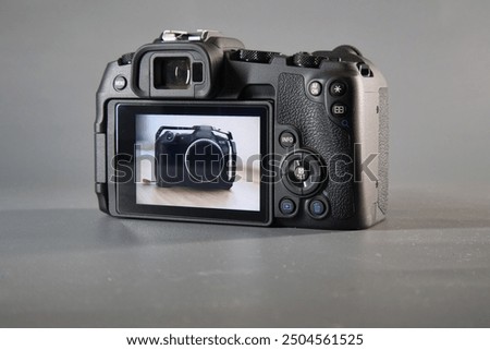 Mirrorless camera back, and side views including screen on and off