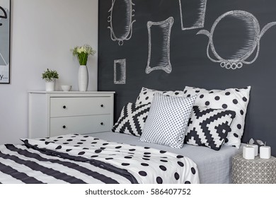 Mirrors Drawn On Chalkboard Wall In Black And White Bedroom