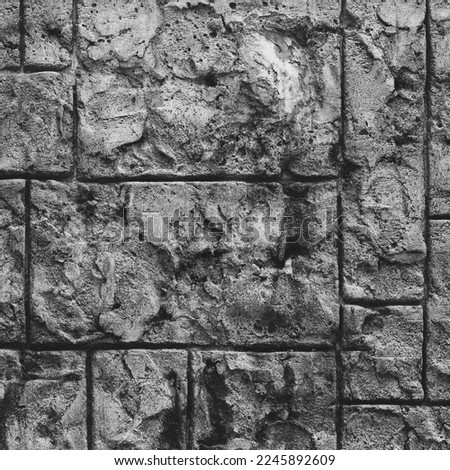 Misc Decorative Concrete Stamp Patterned wall. Brick Relief. Web Banner. Background. Black and white