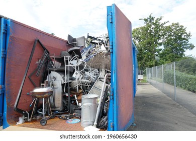 Miscellaneous And Mixed Metal Waste Collected In A Container In A Community Disposal Place. A Public Service Free Of Charge To Prevent Littering The Environment. 