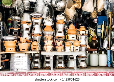 Miscellaneous street shop.Traditional local store front of charcoal burning stove of miscellaneous shop. Terracotta stove for grilling, frying, stirring and boiling. Seen in many countryside of Asia.