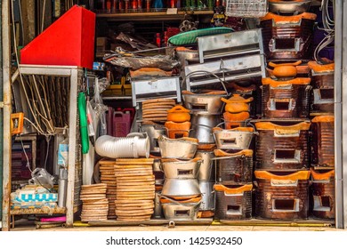 Miscellaneous street shop.Traditional local store front of charcoal burning stove of miscellaneous shop. Terracotta stove for grilling, frying, stirring and boiling. Seen in many countryside of Asia.