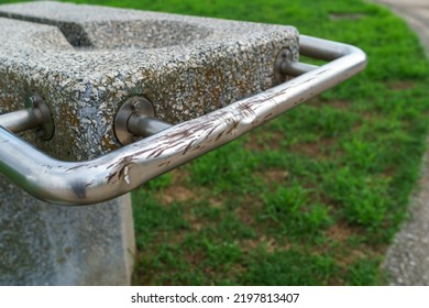 Mischief Damage To Park Facilities. Malicious Acts, Damage To Property. A Scar On The Watering Hole Railing.