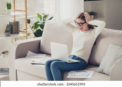 Misfortune Manager Aggressive Hardworking Crying People Concept. Sad Upset Furious Angry Beautiful Depressed Troubled Worker Touching Head Screaming Looking At Netbook Sitting On Divan At Hotel