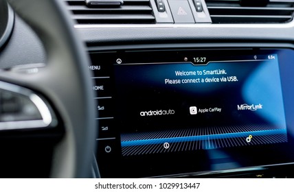 MISKOLC, HUNGARY - FEBRUARY 17, 2018: On Board Computer In A Modern Car Displaying Available Phone Connection Services Like Android Auto And Apple CarPlay