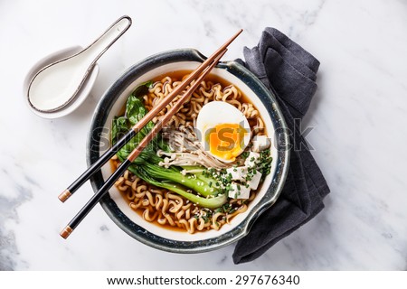 Similar – Image, Stock Photo Vegetarian vegetable and tofu sandwich with yogurt sauce. black background