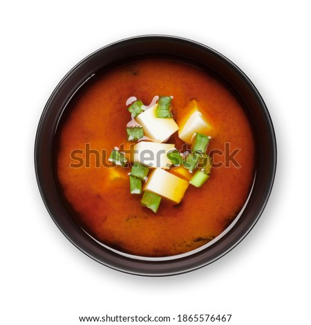 Miso traditional Japanese soup with tofu and spring onion. Isolated on white background. Top view flat lay ストックフォト © 