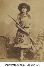 Miss Annie Oakley in 1885, the year she and husband Frank Butler joined BUFFALO BILLS WILD WEST. At five feet tall, Oakley was given the nickname of Watanya Cicilla by fellow performer Sitting Bull, w