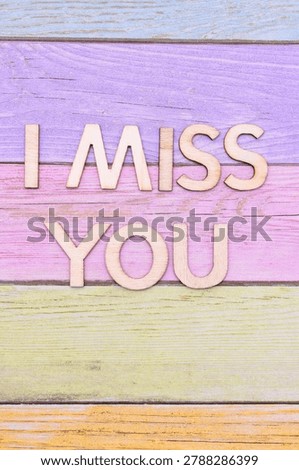 i miss you write on rustical wooden background 