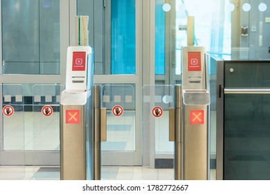 Missed flight concept, being late to flight. Red Cross the passage is closed sign Empty gateway terminal area in airport, closed boarding gate for check-in of passengers with boarding pass.