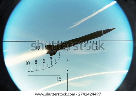 Missile with active engine observed in sight during aerial interception.