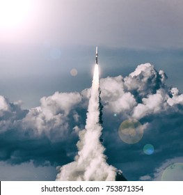 Missile Launch. The Elements Of This Image Furnished By NASA.
