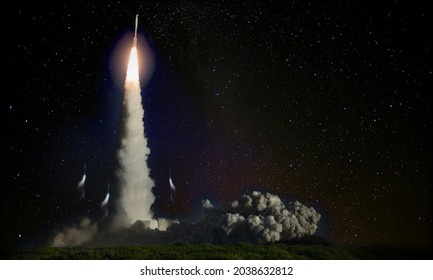 Missile Launch At Night. Elements Of This Image Furnished By NASA.