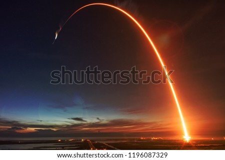 Missile launch at night. The elements of this image furnished by NASA.
