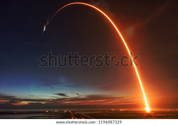 Missile launch at night. The elements of this image\
furnished by NASA.