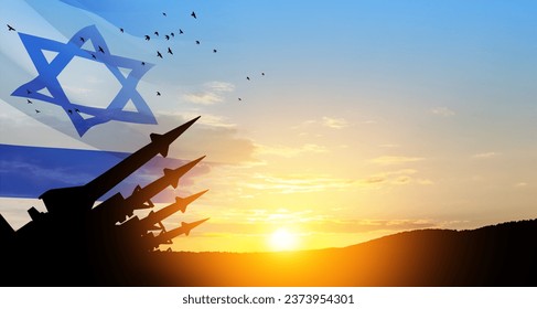 The missiles are aimed at the sky at sunset with Israel flag. Nuclear bomb, chemical weapons, missile defense, a system of salvo fire.