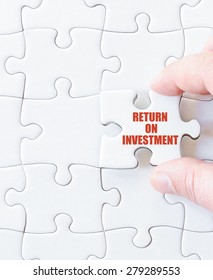Missing jigsaw puzzle piece with words Return On Investment. Business concept image for completing the puzzle. - Shutterstock ID 279289553