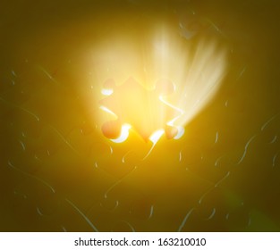 Missing jigsaw puzzle with ray of light coming out from the background, business concept for completing the final puzzle piece