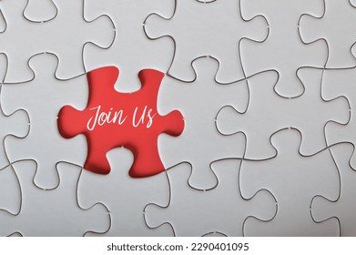 Missing jigsaw puzzle written with JOIN US. - Powered by Shutterstock