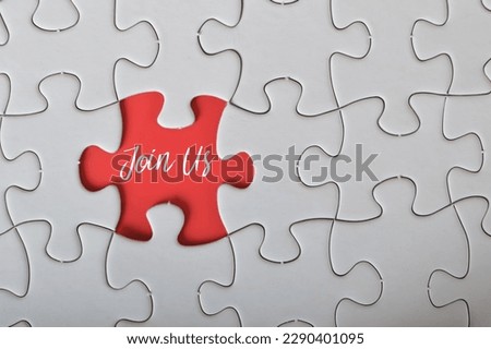 Missing jigsaw puzzle written with JOIN US.