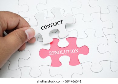 Missing puzzle with a word CONFLICT RESOLUTION. Business and finance concept - Shutterstock ID 584766541