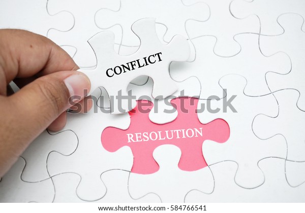 Missing puzzle with a word CONFLICT RESOLUTION.\
Business and finance\
concept