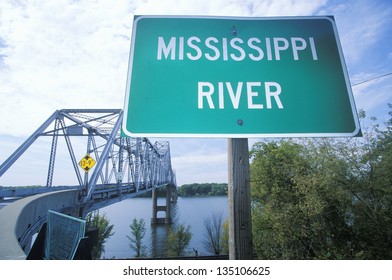 Mississippi River Sign In Front Of A Truss Bridge