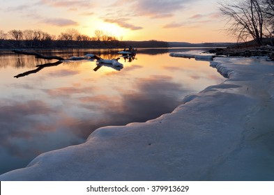 Mississippi River In South Saint Paul Minnesota At Sunrise In Winter Along Icy Banks