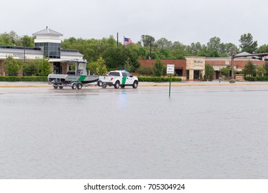 Missouri City, Texas - August 29, 2017: Texas Border Guard Trucks With Boats On State Highway 6 Heading East. Thousands Of National Guard Troops Have Been Deployed For Rescue Missions In Houston Area