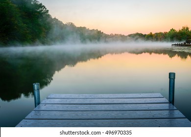 A mist cover lake in the early morning. - Powered by Shutterstock