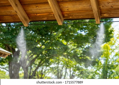 Mist Nozzle Water Spraying System On A Hot Summer Day