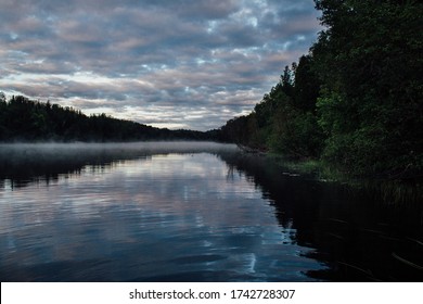 Mist On The Spanish River In Massey Ontario With Cloudy Sky