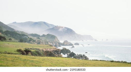 Mist Rises From The Big Sur Coastline 