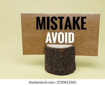 Mistake Avoid Concept on Brown Background for Error Prevention, Risk Management, and Learning from Failures in Business and Life. 