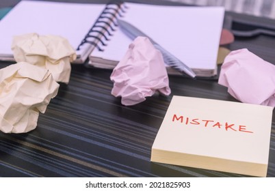 Mistake Written On Sticky Notes. Learning, Wrong, Blooper, Error Message, Regret Sayings Background. Fault, Defect, Careless, Lesson Correction And Reconciliation Concept For Business Finance Industry