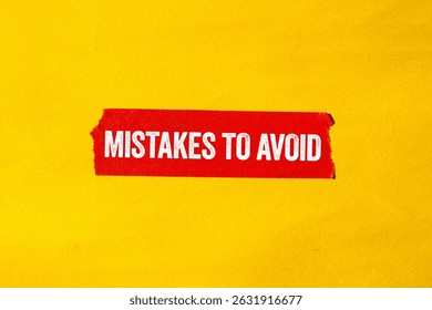 Mistakes to avoid message written on ripped torn red paper tape on yellow background. Conceptual mistakes to avoid symbol. Copy space.